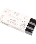 Protection spell in a box with three grey ritual candles