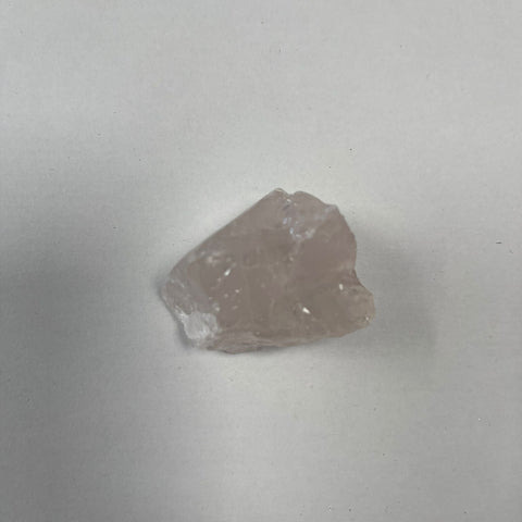 Raw rose quartz piece approximately 3-4cm on white background — Fragrant Heaven