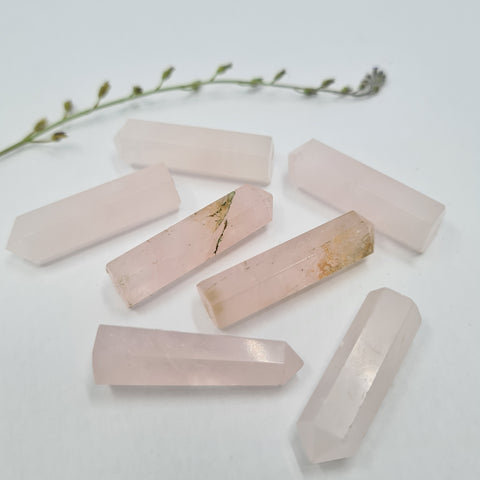 Rose Quartz crystal point with soft pink tones symbolising love, compassion, and emotional healing. Associated with the Heart Chakra and the signs Taurus, Libra, and Scorpio.