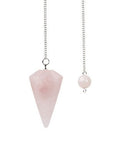 Faceted rose quartz pendulum on metal chain showing soft pink colour on white background — Fragrant Heaven