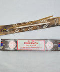 Satya Cinnamon Incense Sticks 15g box on a white background, with a warm and invigorating aroma.