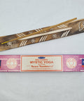 Satya Mystic Yoga Nag Champa Incense Sticks 15g box on a white background, crafted to enhance yoga and meditation.