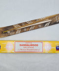 Satya Sandalwood Incense Sticks 15g box on a white background, offering a classic woody aroma for relaxation.