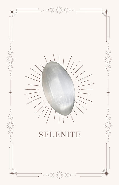Selenite meaning card front showing white translucent tumbled stone on cream mystical bordered card — Fragrant Heaven