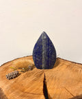 Sodalite Freeform Crystal – a polished freeform sodalite crystal with deep blue and white tones, known for clarity, calm, communication, and emotional balance.