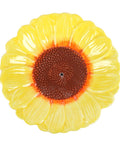 Top view of sunflower-shaped ceramic incense holder on white background