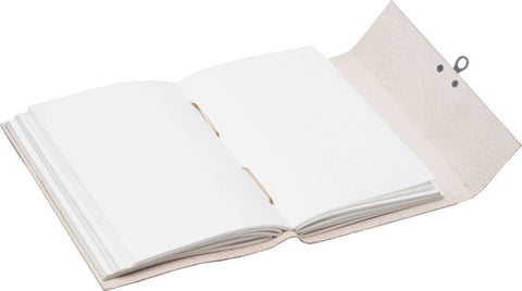 tree embossed leather journal open showing natural shade blank pages for writing and reflection