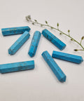 Turquoise Howlite crystal point with soft blue tones symbolising calm, balance, and clear communication. Associated with the Throat Chakra and signs Virgo and Gemini.