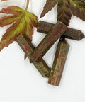 Unakite crystal point with green and pink tones symbolising healing, balance, and grounding. Associated with the Heart Chakra and the astrological sign Scorpio.