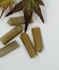 Yellow Jasper crystal point with golden tones symbolising protection, grounding, and confidence. Associated with the Solar Plexus Chakra and signs Leo and Virgo.